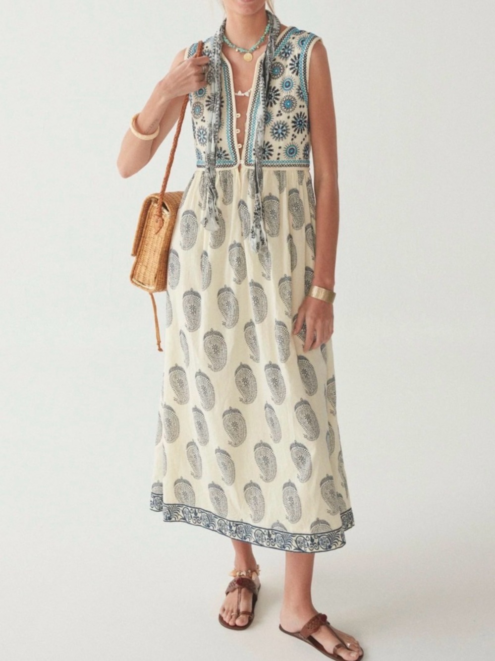 Sleeveless Cream Maxi Dress with Blue Embroidered Bodice